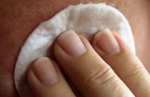 cleaning skin with cotton